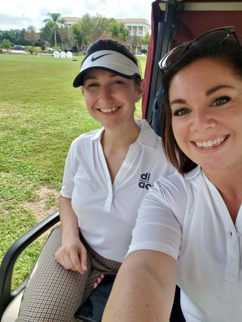 HMSHost Foundation’s 30th Annual Golf Classic - Kara and Jessica in Golf Cart